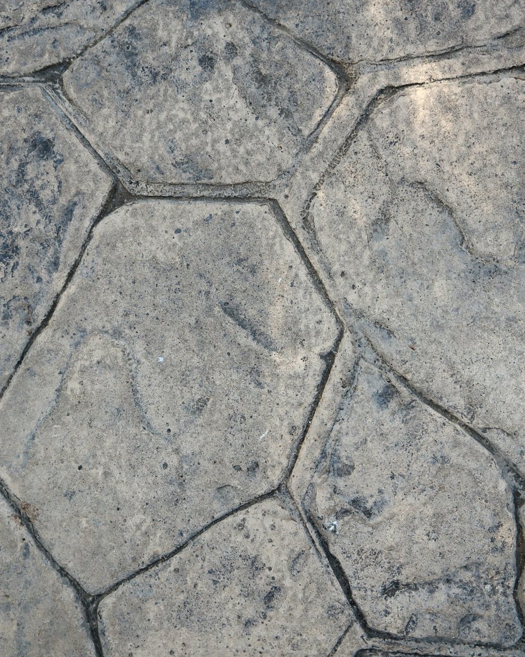 Close-up of a stamped concrete flagstone pattern