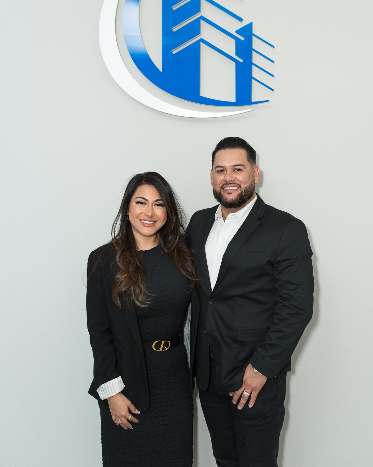 The owners of Lexus Concrete LLC at the company office in Houston, Texas