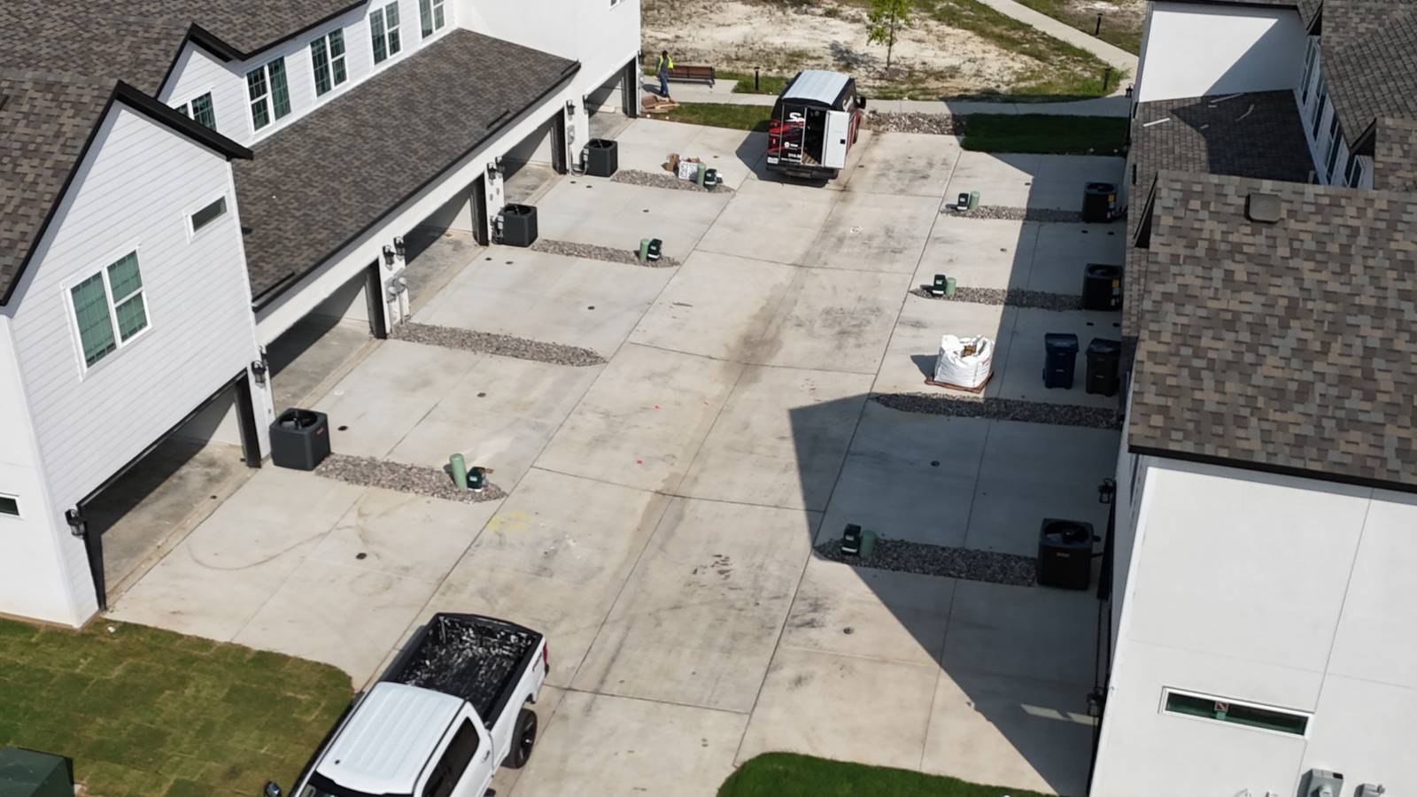 New concrete driveways between homes in Red Oak, Dallas / Fort Worth